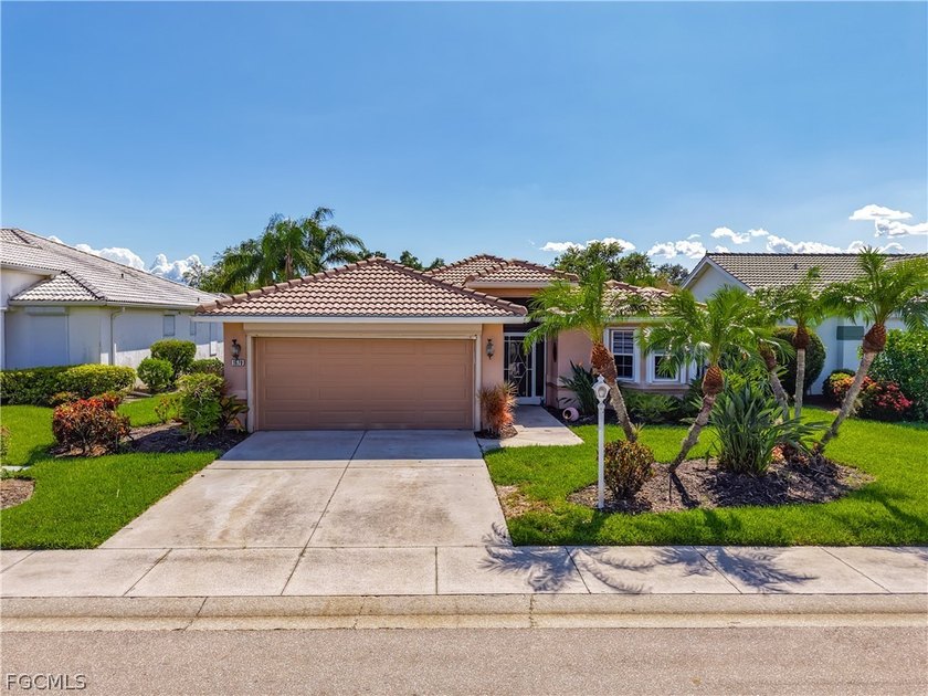 GOLF COURSE VIEWS + RESORT LIVING IN HERONS GLEN! Enjoy stunning - Beach Home for sale in North Fort Myers, Florida on Beachhouse.com