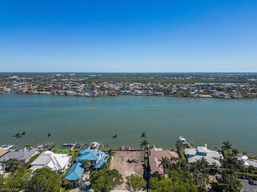 Opportunity awaits! This sprawling lot is the perfect canvas for - Beach Lot for sale in Naples, Florida on Beachhouse.com