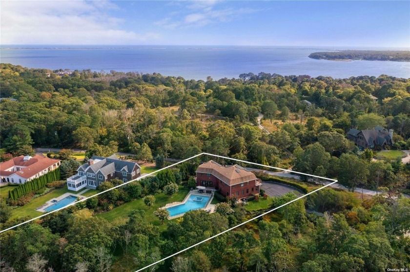 Nestled on a pristine acre in Shinnecock Hills, this - Beach Home for sale in Hampton Bays, New York on Beachhouse.com