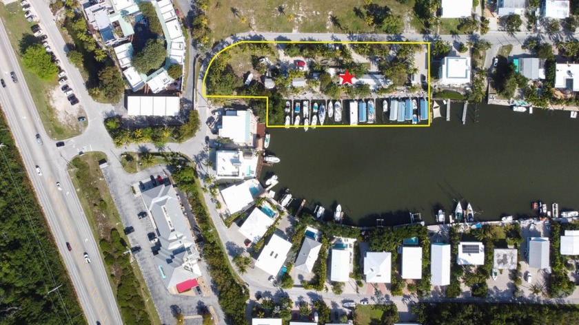 Tranquil ''Old Keys'' style marina nestled on a rare 1 + acre - Beach Commercial for sale in Plantation Key, Florida on Beachhouse.com