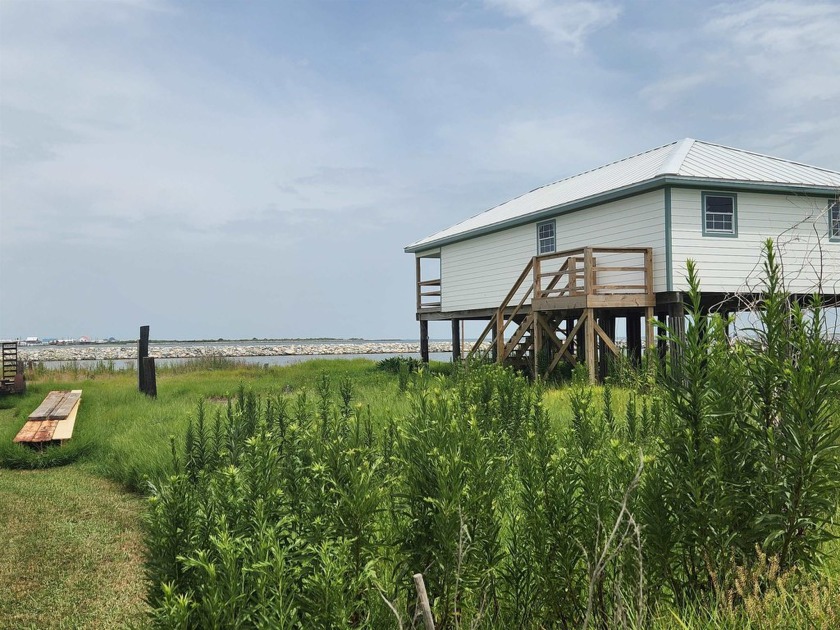 This waterfront lot is 34' along Bay Caminada. Located across - Beach Lot for sale in Grand Isle, Louisiana on Beachhouse.com