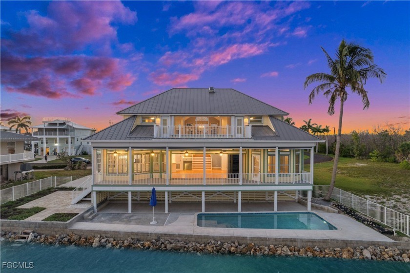 Step into a world where every sunrise paints the sky with pastel - Beach Home for sale in St. James City, Florida on Beachhouse.com