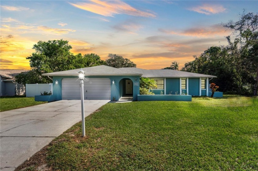 This Beautiful newly renovated pool home is located right - Beach Home for sale in Spring Hill, Florida on Beachhouse.com