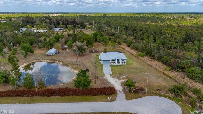 Privacy meets versatility on this 5.58-acre retreat bordering a - Beach Home for sale in North Fort Myers, Florida on Beachhouse.com