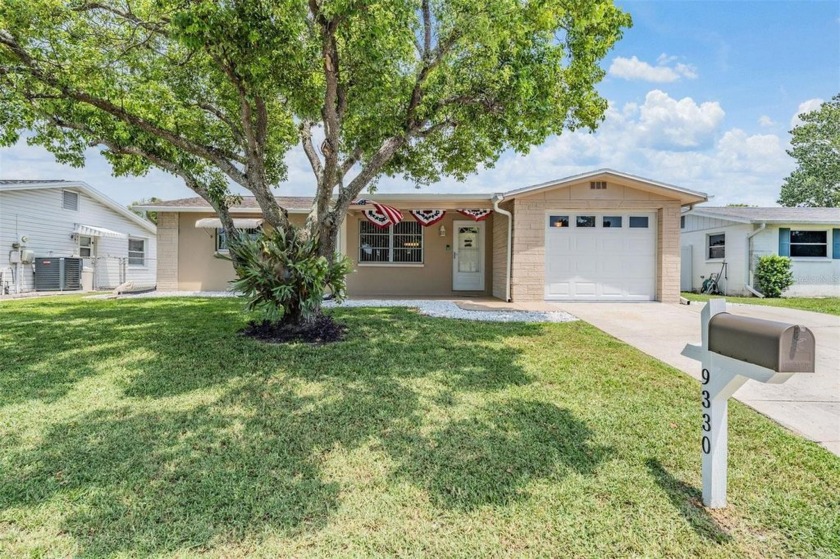 Make this adorable beachy bungalow your very own! This home has - Beach Home for sale in Port Richey, Florida on Beachhouse.com