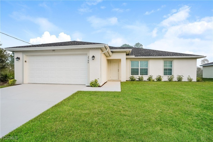 Discover this 3 bedroom, 2 bathroom offering 1,841 sq ft of - Beach Home for sale in Lehigh Acres, Florida on Beachhouse.com