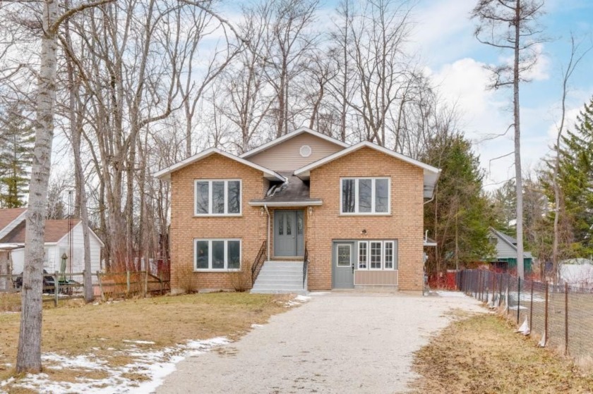 Nestled in the heart of vibrant Wasaga Beach, this 1400 square - Beach Home for sale in Wasaga Beach,  on Beachhouse.com