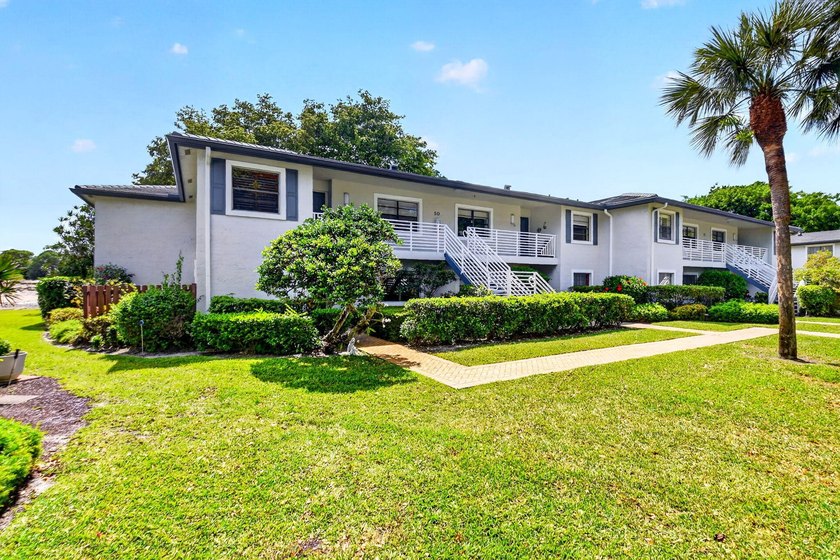 Located in Hunters Run Country Club, this desirable first-floor - Beach Condo for sale in Boynton Beach, Florida on Beachhouse.com