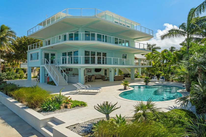 Experience the perfect blend of elegance and tropical charm in - Beach Home for sale in Lower Matecumbe Key, Florida on Beachhouse.com