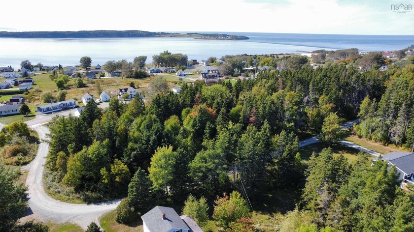 Discover the potential of this picturesque vacant land totaling - Beach Lot for sale in Port Hood, Nova Scotia on Beachhouse.com