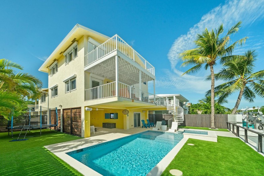 Experience sun-soaked days on the water and live in one of the - Beach Home for sale in Plantation Key, Florida on Beachhouse.com