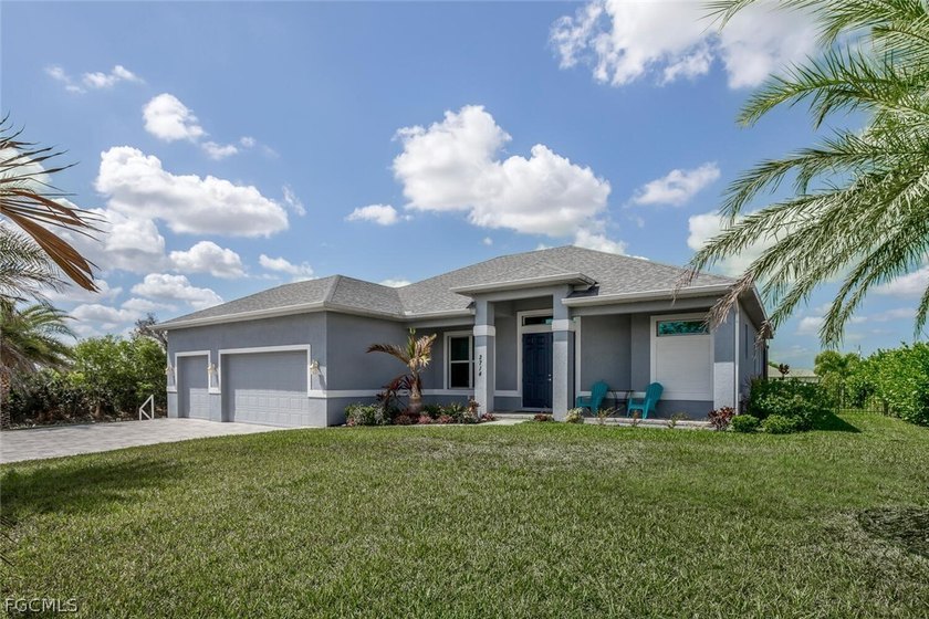 Turnkey Waterfront Pool Home on Intersecting Canal Lot | 3 Bed + - Beach Home for sale in Cape Coral, Florida on Beachhouse.com