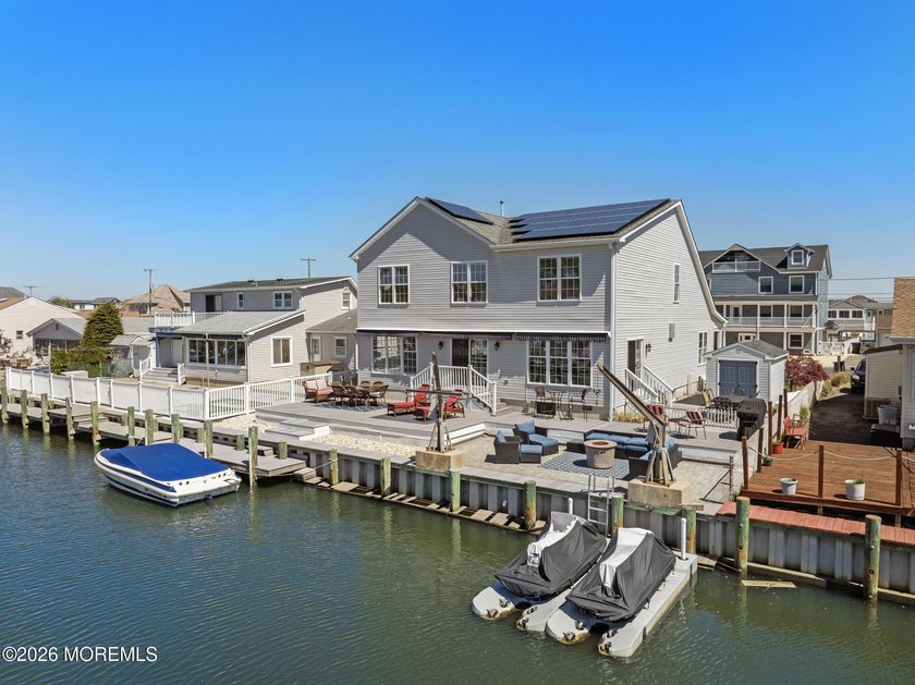 This is where summer becomes a lifestyle. Positioned in Snug - Beach Home for sale in Toms River, New Jersey on Beachhouse.com