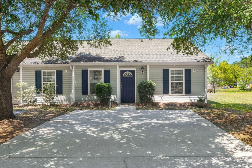 Nestled in a quiet, picturesque neighborhood this 2 bedroom, 2 - Beach Home for sale in Charleston, South Carolina on Beachhouse.com