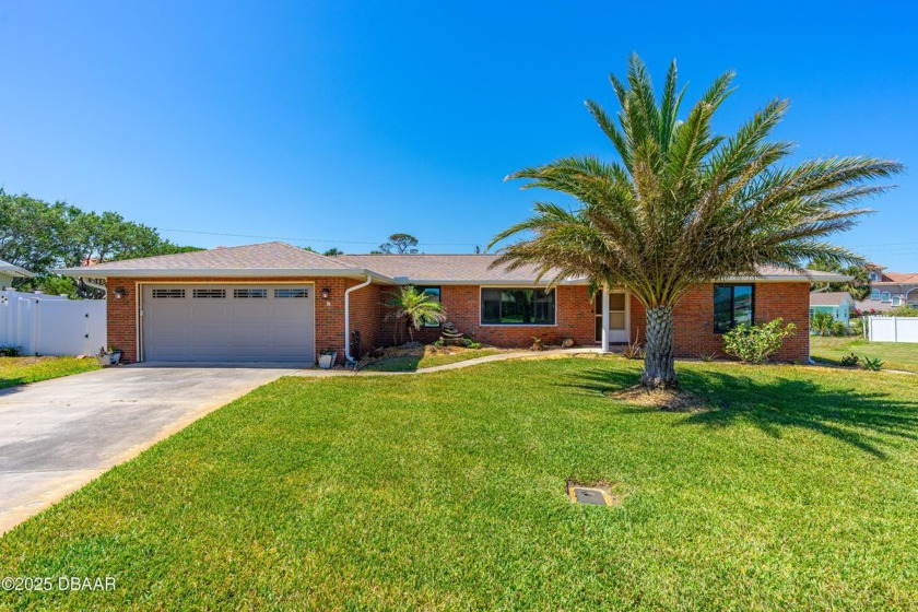 Charming coastal residence situated in a highly sought-after - Beach Home for sale in Ormond Beach, Florida on Beachhouse.com