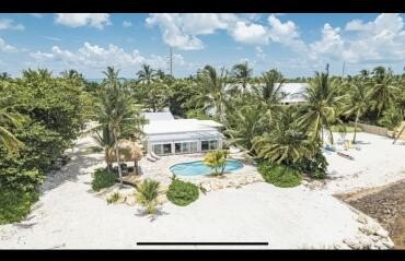 This beautiful home / compound has not One, but TWO dwellings! - Beach Home for sale in Lower Matecumbe Key, Florida on Beachhouse.com