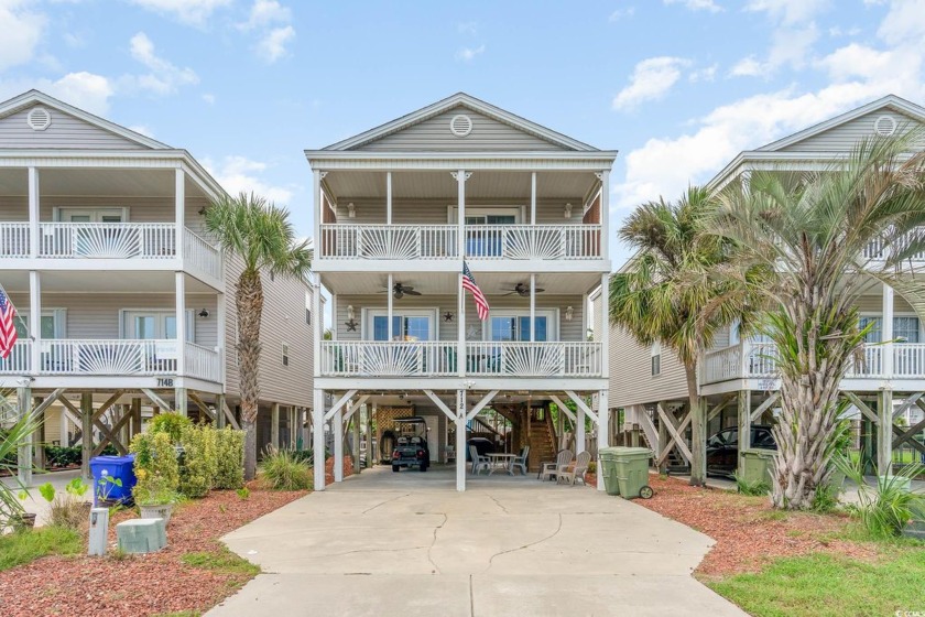 Just steps from the beach, this turn-key 2nd row home offers the - Beach Home for sale in Surfside Beach, South Carolina on Beachhouse.com