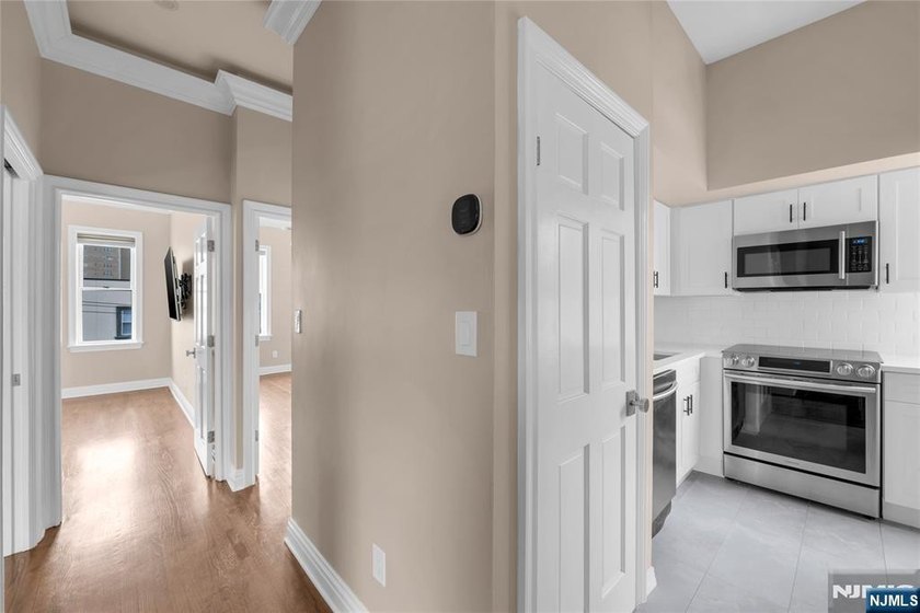 Welcome home! This beautifully renovated condominium is just - Beach Condo for sale in Guttenberg, New Jersey on Beachhouse.com