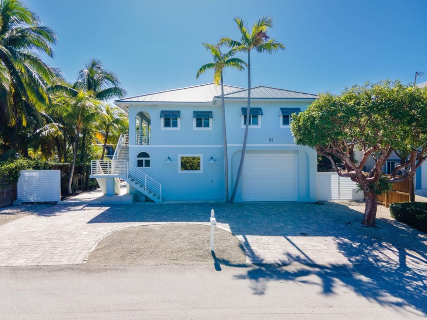 Welcome to your tropical oasis! This beautifully maintained - Beach Home for sale in Plantation Key, Florida on Beachhouse.com