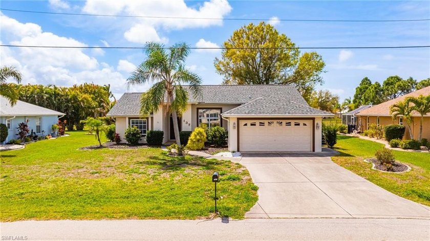 Designed for easy Florida living, this 3-bedroom, 2-bath home on - Beach Home for sale in Punta Gorda, Florida on Beachhouse.com