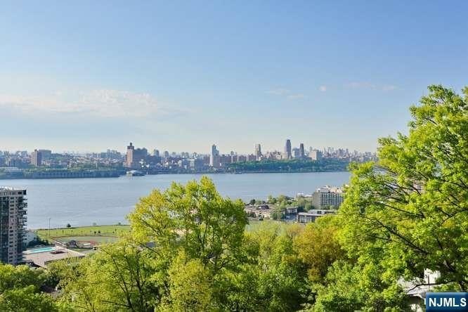 Step into space, light and incredible potential with this two - Beach Home for sale in Fort Lee, New Jersey on Beachhouse.com
