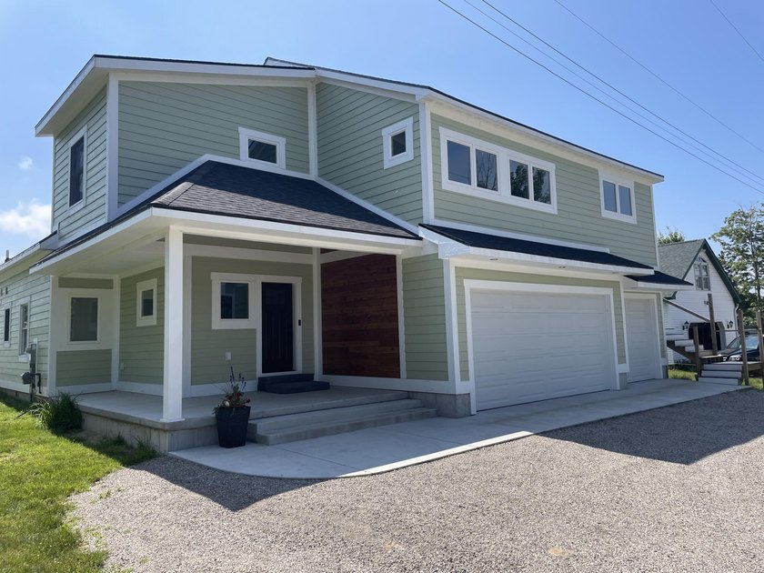 Premier location on Portage Lake (channel to Lake Michigan) - Beach Home for sale in Onekama, Michigan on Beachhouse.com