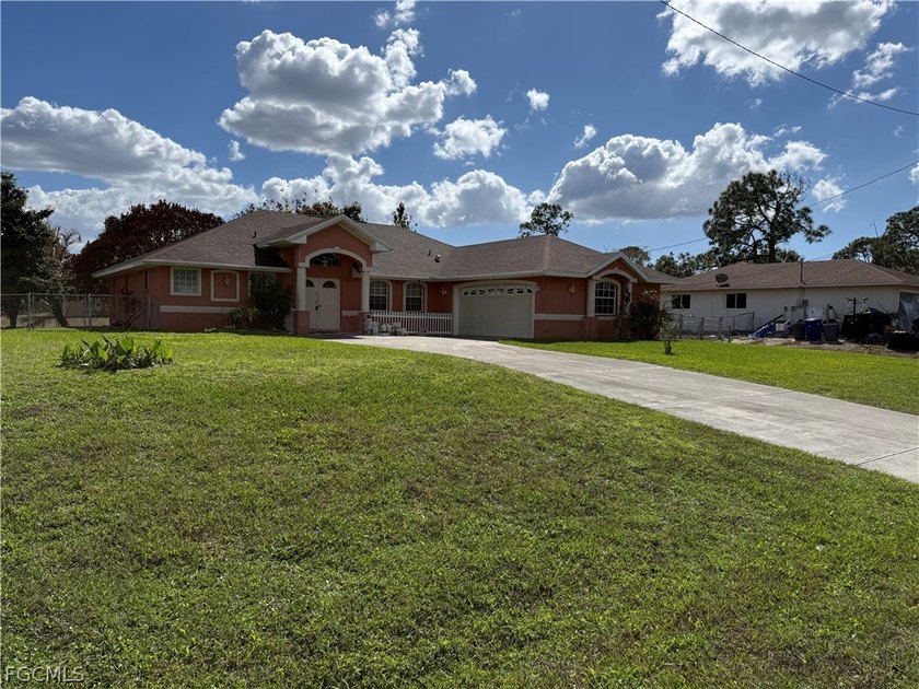 Don't miss this spacious 3-bedroom, 2-bath home on a desirable - Beach Home for sale in Lehigh Acres, Florida on Beachhouse.com