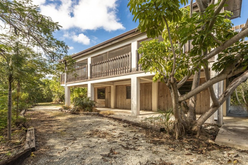 Drive down the secluded lane and you will find nestled on almost - Beach Home for sale in Big Pine Key, Florida on Beachhouse.com