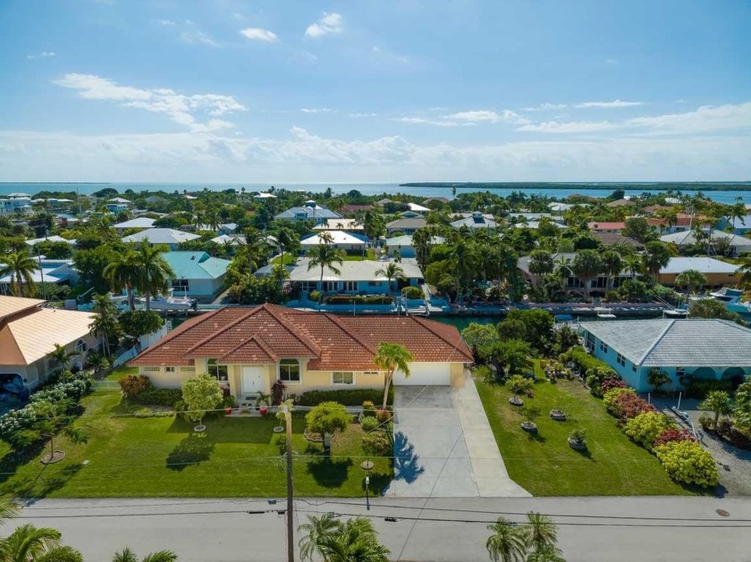 Stunning canal front home in desirable Cudjoe Gardens, with - Beach Home for sale in Cudjoe Key, Florida on Beachhouse.com