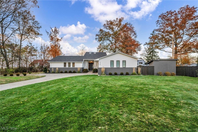 Welcome to a truly magnificent lakefront retreat on a premier 1 - Beach Home for sale in Sheffield Lake, Ohio on Beachhouse.com