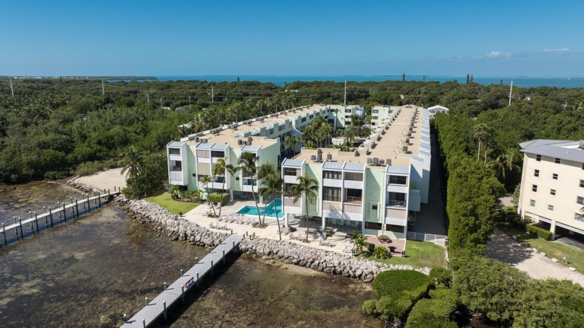 Welcome to this updated & turn-key 2 bedroom, 1.5 bathroom end - Beach Home for sale in Plantation Key, Florida on Beachhouse.com