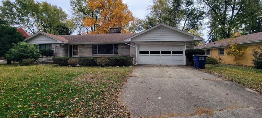 Welcome to this gracious sprawling limestone ranch in the highly - Beach Home for sale in Michigan City, Indiana on Beachhouse.com