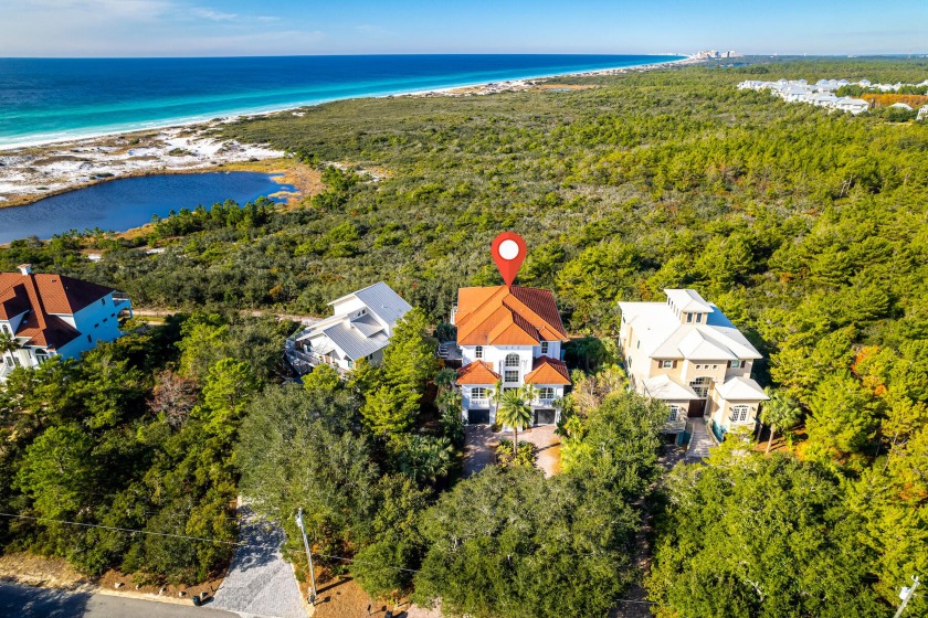 This 5BR/5BA home is artfully situated on the border of Topsail - Beach Home for sale in Santa Rosa Beach, Florida on Beachhouse.com