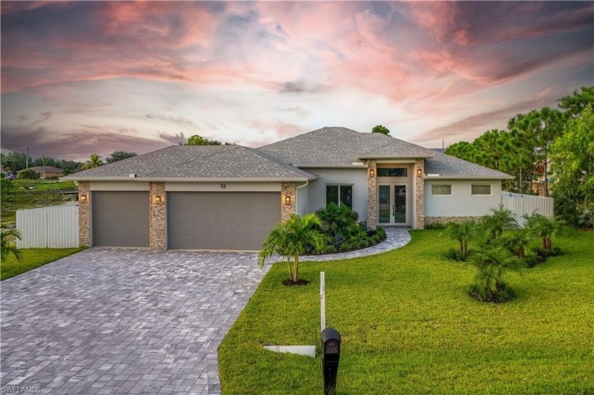 Introducing a stunning waterfront estate that epitomizes luxury - Beach Home for sale in Cape Coral, Florida on Beachhouse.com