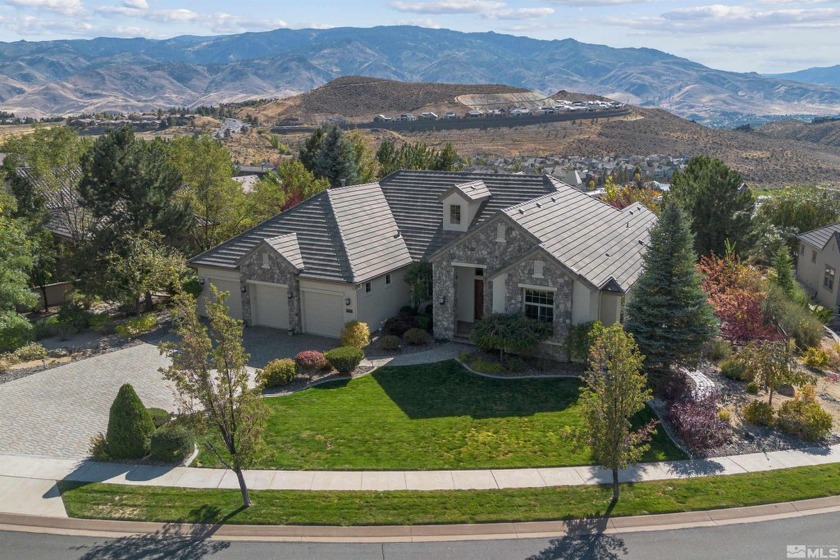 A stunning semi-custom home located in the prestigious Somersett - Beach Home for sale in Reno, Nevada on Beachhouse.com