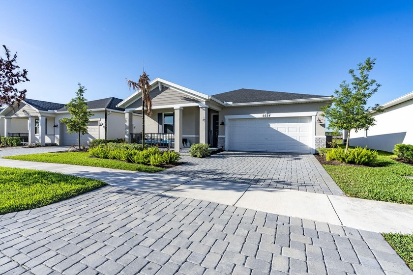 Welcome to this beautifully designed 2023 Meritage home in the - Beach Home for sale in Port Saint Lucie, Florida on Beachhouse.com