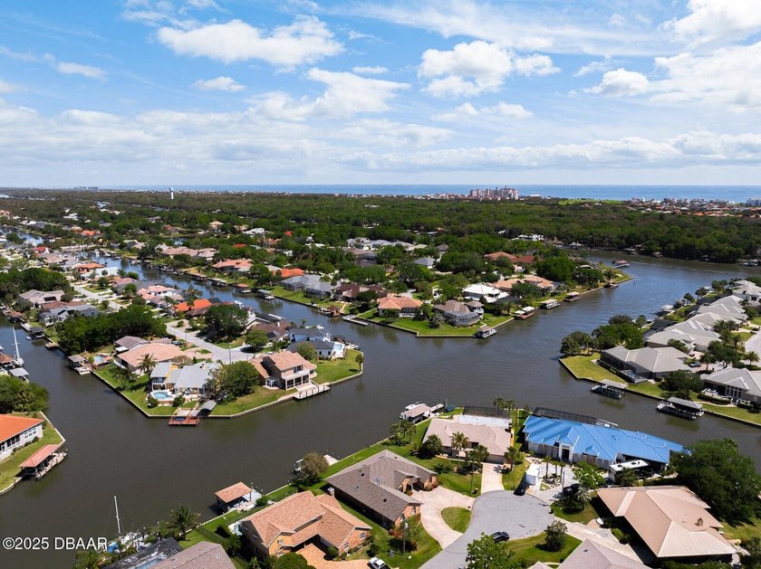 Waterfront Living at Its Finest! Welcome to this beautifully - Beach Home for sale in Palm Coast, Florida on Beachhouse.com