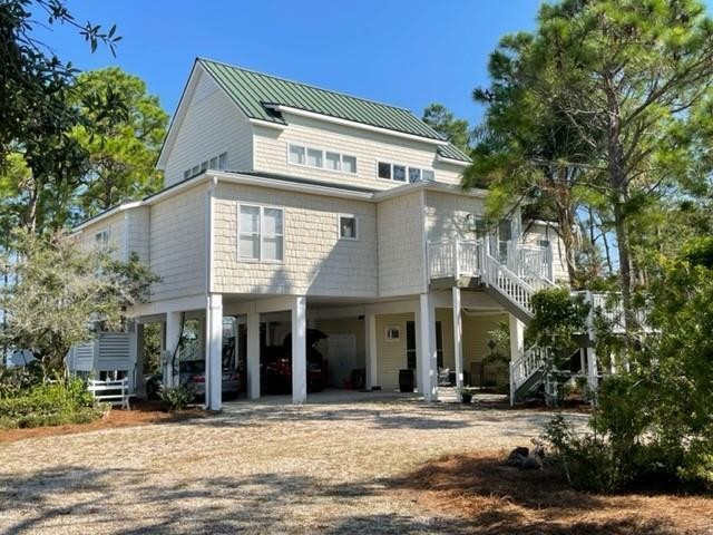 CHECK OUT THE 3D TOUR!  BAY FRONT HOUSE with COVERED DOCK! You - Beach Home for sale in St. George Island, Florida on Beachhouse.com