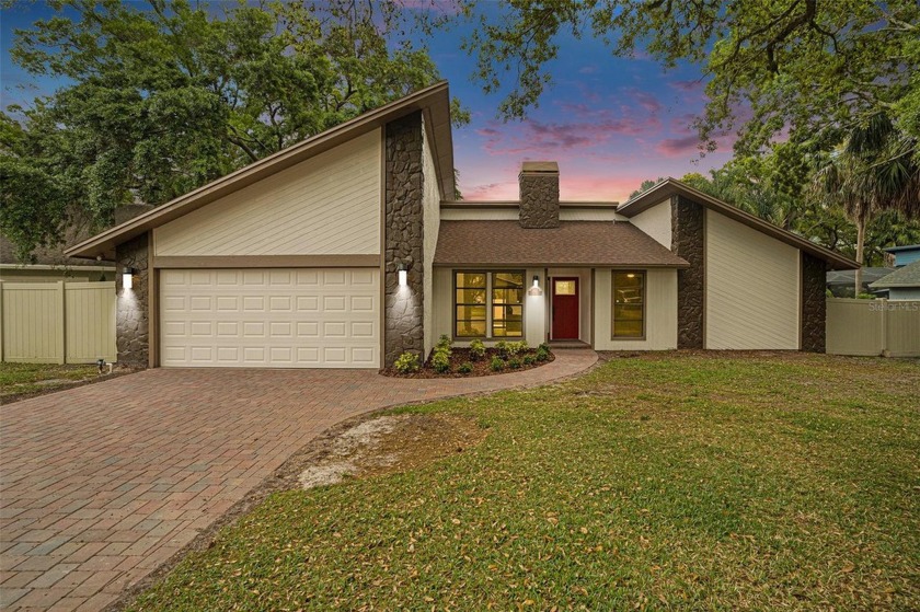 Welcome to your dream home in the heart of Tampa's serene Lake - Beach Home for sale in Tampa, Florida on Beachhouse.com