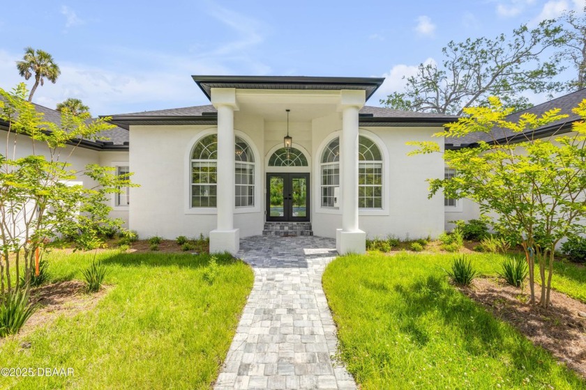 Luxurious recently remodeled home designed to reflect a 2025 - Beach Home for sale in New Smyrna Beach, Florida on Beachhouse.com