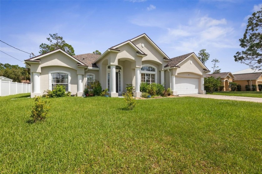 Welcome home! This 4 bedroom 2.5 bath with an additional - Beach Home for sale in Palm Coast, Florida on Beachhouse.com