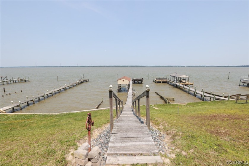 Just in time for Summer, this quintessential Riverfront Cottage - Beach Home for sale in Dunnsville, Virginia on Beachhouse.com