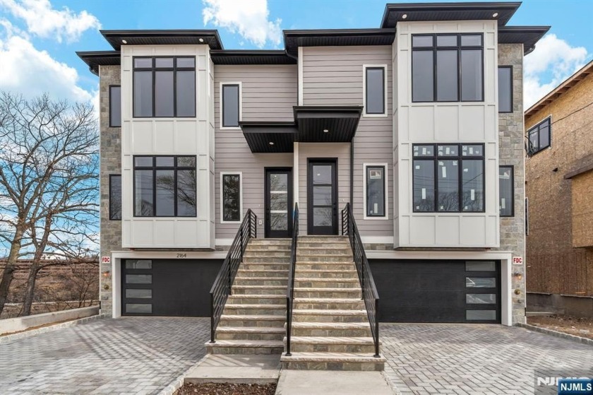 Welcome to 2162 Jones Road, a sleek 5-level duplex offering over - Beach Home for sale in Fort Lee, New Jersey on Beachhouse.com