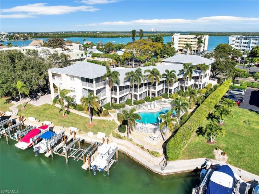 This meticulously maintained condo situated on a canal offers - Beach Condo for sale in Marco Island, Florida on Beachhouse.com