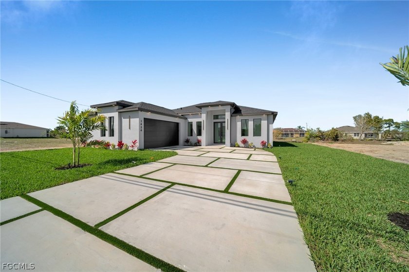 LUXURY NEW CONSTRUCTION WATERFRONT HOME ON FRESHWATER CANAL IN - Beach Home for sale in Cape Coral, Florida on Beachhouse.com