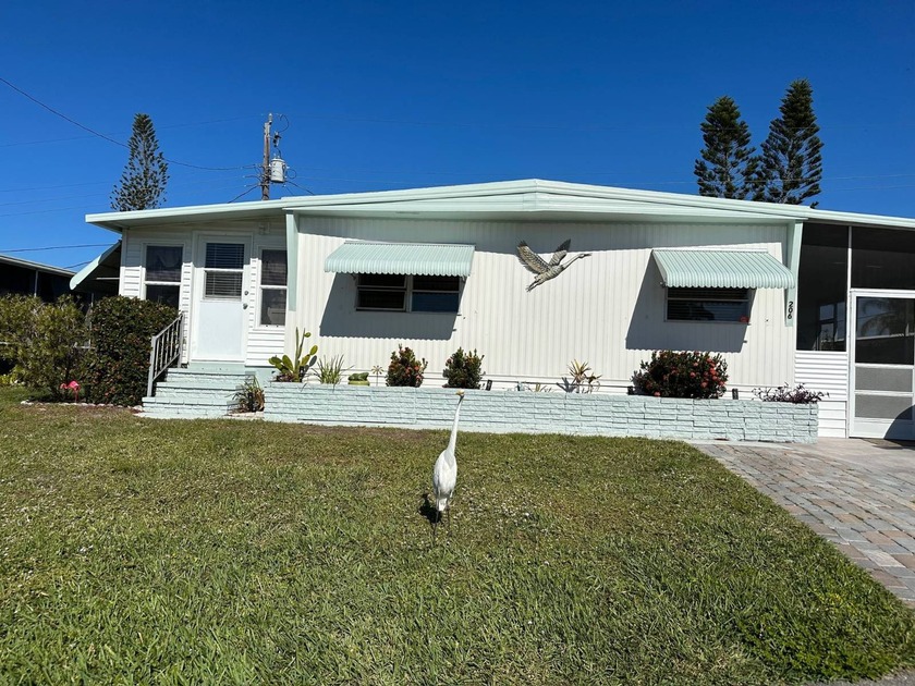 What a dollhouse!  As soon as you step inside, you'll feel right - Beach Home for sale in Nokomis, Florida on Beachhouse.com