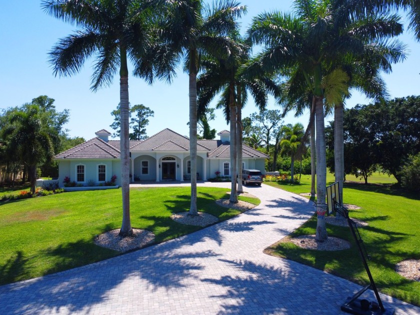 Beautiful custom home in the highly desired neighborhood of - Beach Home for sale in Palm City, Florida on Beachhouse.com