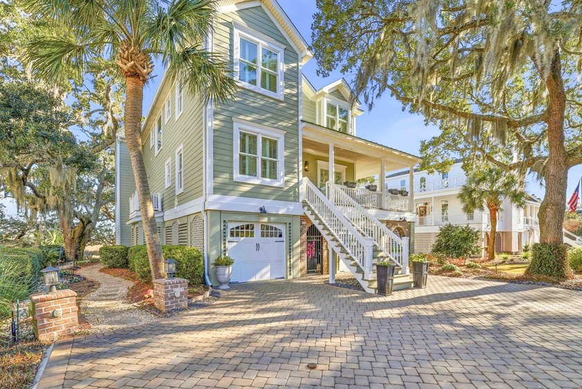 Welcome to this stunning creek front home with boat dock located - Beach Home for sale in Pawleys Island, South Carolina on Beachhouse.com