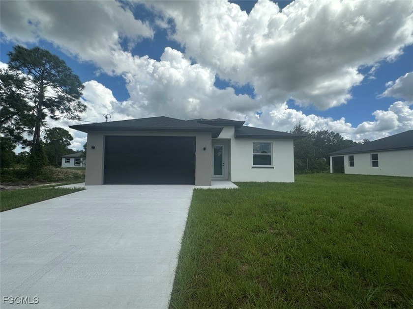 Modern New Construction Home - Move-In Ready! Seller is offering - Beach Home for sale in Lehigh Acres, Florida on Beachhouse.com