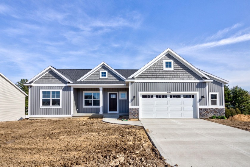 This 3 bedroom ranch style home in Westwind Lake Estates is - Beach Home for sale in Holland, Michigan on Beachhouse.com